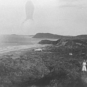 Group of people with a view looking south from North Nobby over Miami to Burleigh Heads, Queensland, circa 1930 Photographer unknown