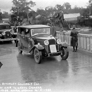 The first motor vehicles to cross the Coomera Bridge for the official opening, Queensland, 14 June 1930 Photographer unknown