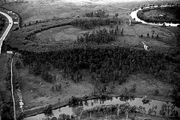 Aerial view over Coombabah Creek and Brisbane Road, Queensland, circa 1970s Photographer unknown Image number LS-LSP-CD118-IMG0035