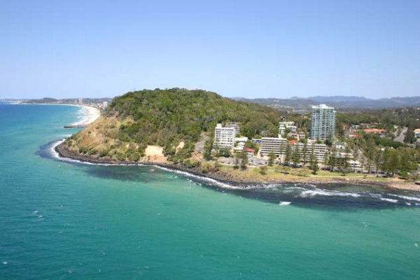 Low aerial from offshore to the headland, Burleigh Heads, Queensland, 2005 Graham Weeks photographer Image number LS-LSP-CD696-IMG0010