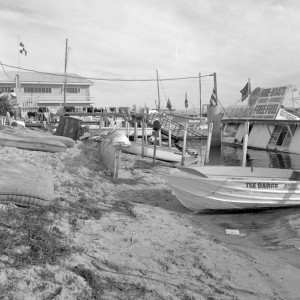 Barge sunk at its moorings near Humphrey’s boatshed at The Spit, Southport, Queensland, June 1971 Bob Avery photographer