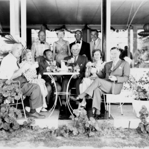 Directors and wives of Chevron Queensland Ltd at Margot Kelly's Hibiscus Room, Surfers Paradise, Queensland, 1957 Alexander McRobbie photographer