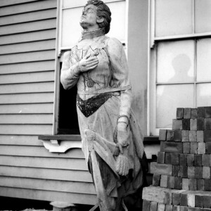 Figurehead of the barque Cambus Wallace outside the Railway Hotel circa 1920s George Jackman photographer