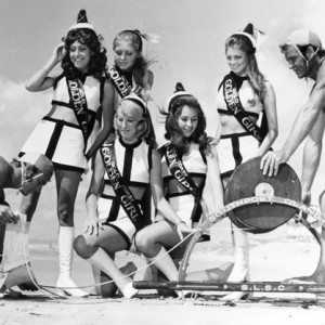 Gold Coast Golden Girls at Main Beach, Queensland with lifesavers and a reel, circa 1970 Len Drummond photographer
