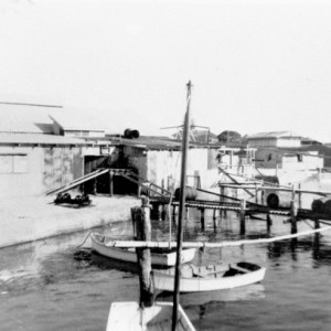 Mineral deposits depot and wharf, Nerang River, Southport, Queensland, circa 1930s Willoughby family, photographer