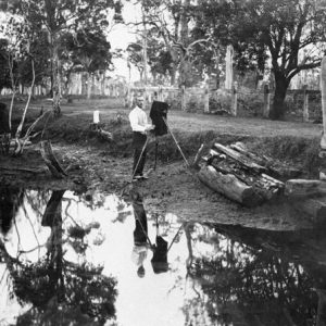 Guy Hunt with camera in natural setting, Southport, circa 1905. Photographer unknown